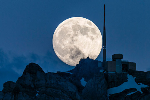 Gorgeous Photographs of the Supermoon Rising Above a Swiss Peak